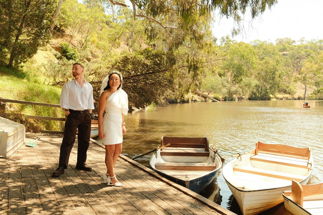 Cecile and Stefan on the jetty among the moored rowing boats