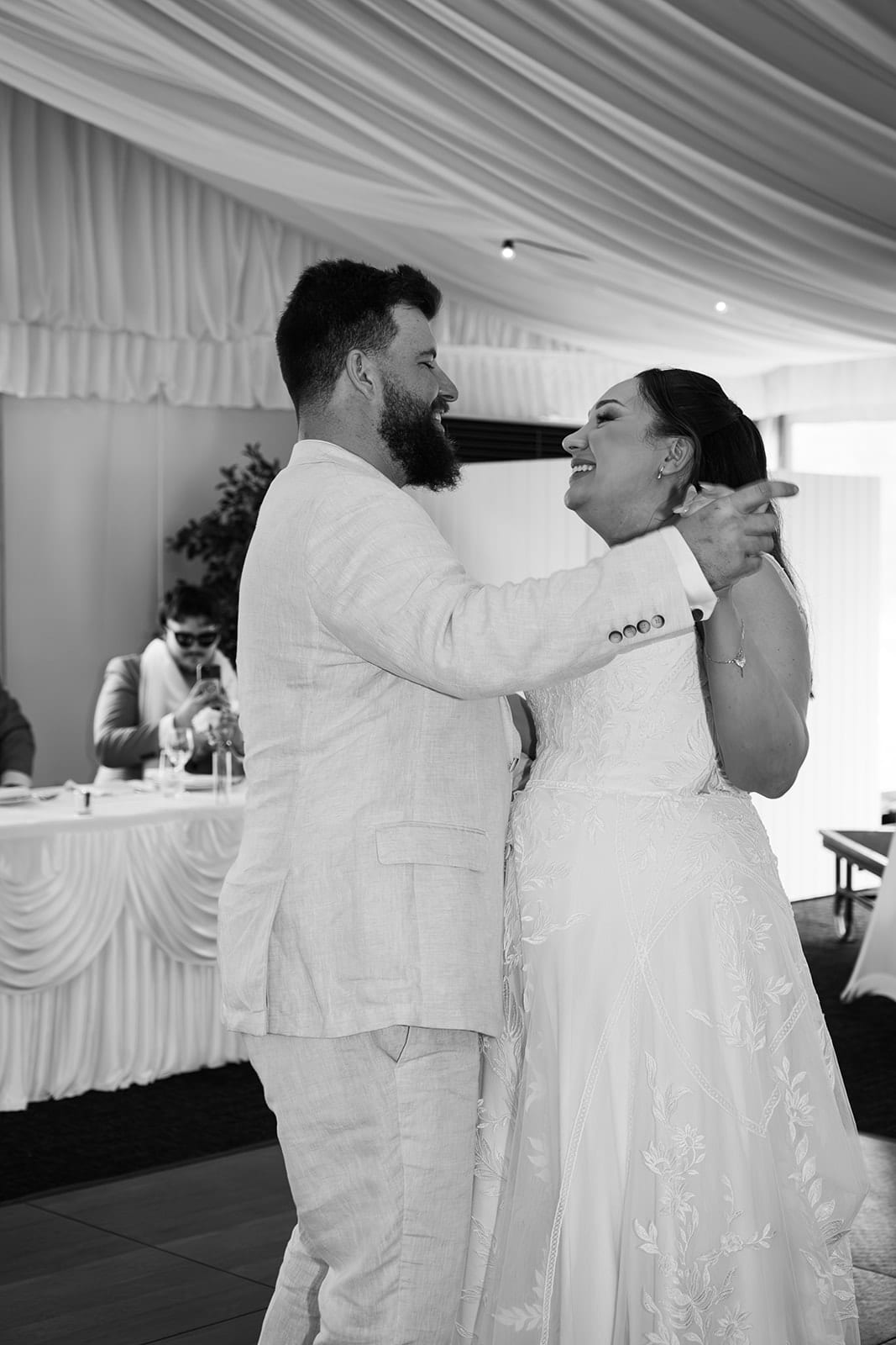 Black and white photo of Karina and Bronson’s first dance in the marquee