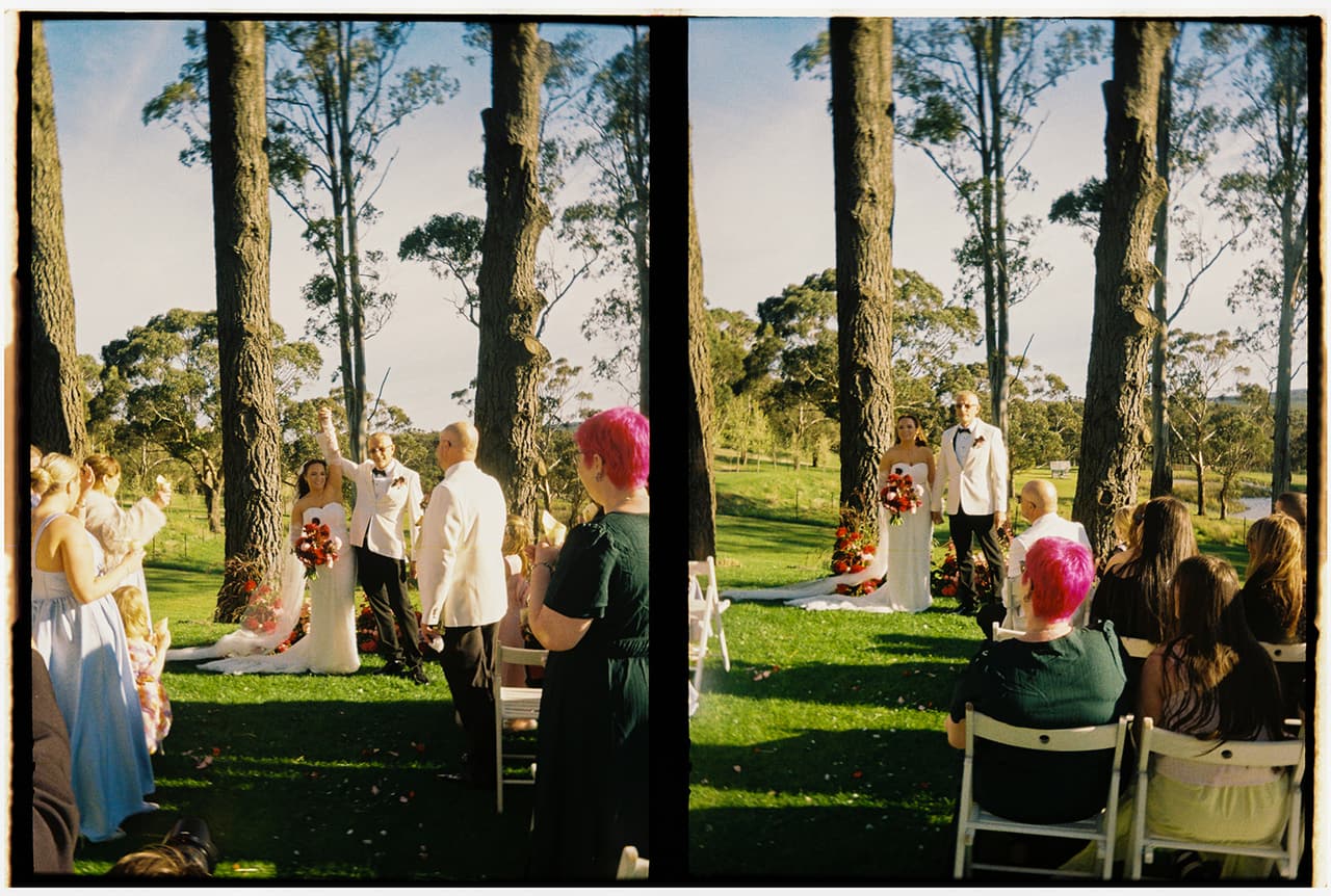 Two half frames side by side: Kristie and Gareth raising their joined hands at the front as their guests cheer, on 35mm film