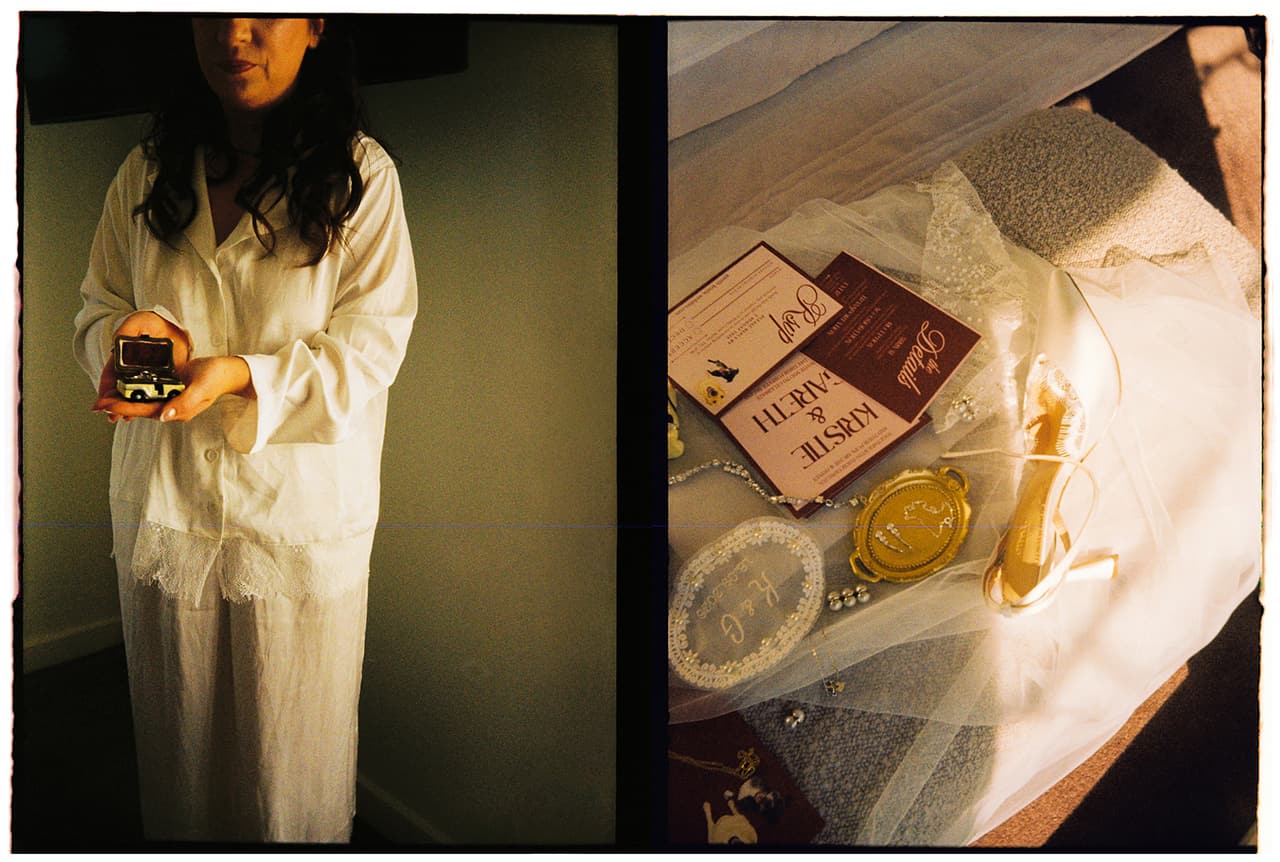 Two half frames side by side: Kristie in satin pyjamas holding an open ring box, and the invitations, shoes and jewellery laid out on her veil, on 35mm film
