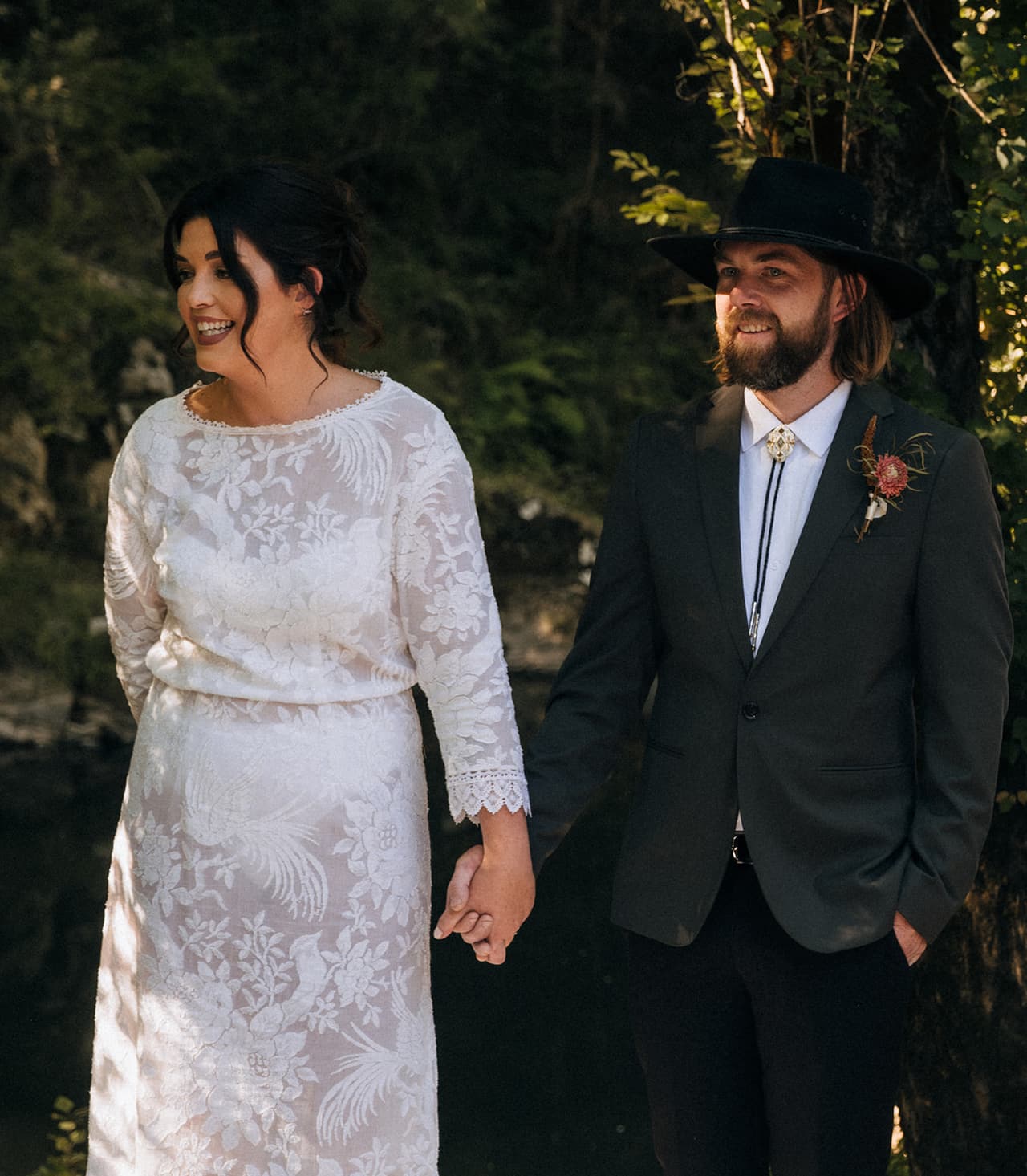 Lana and Todd smiling side by side at the front of the ceremony