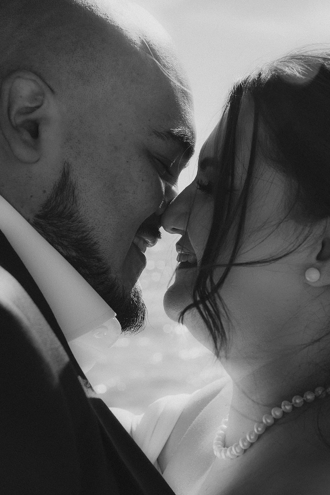 Black and white close up of Martina and Diego, foreheads together