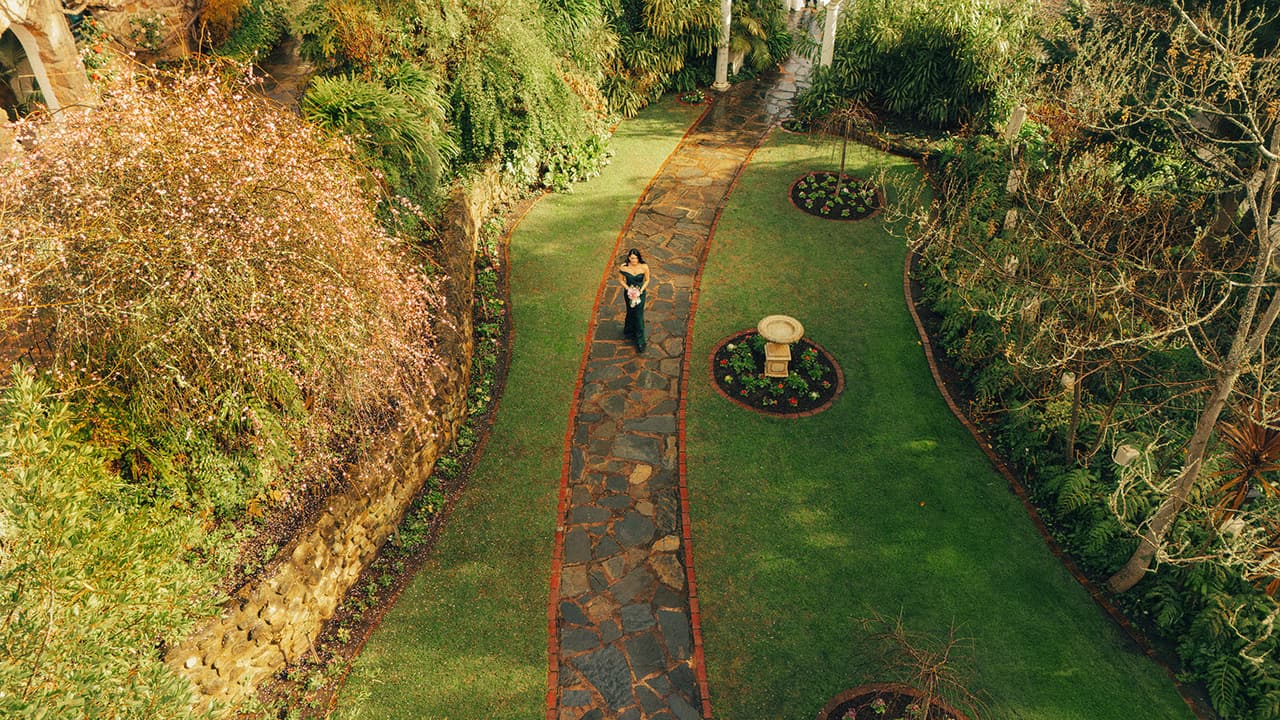 The garden drive and the couple from above, taken by drone