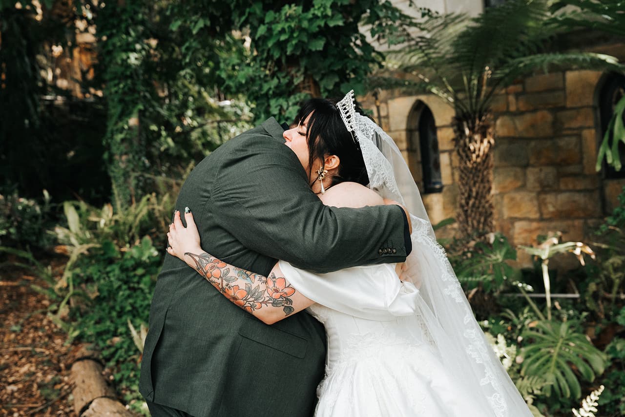 Porscha hugging her dad at their first look in the garden