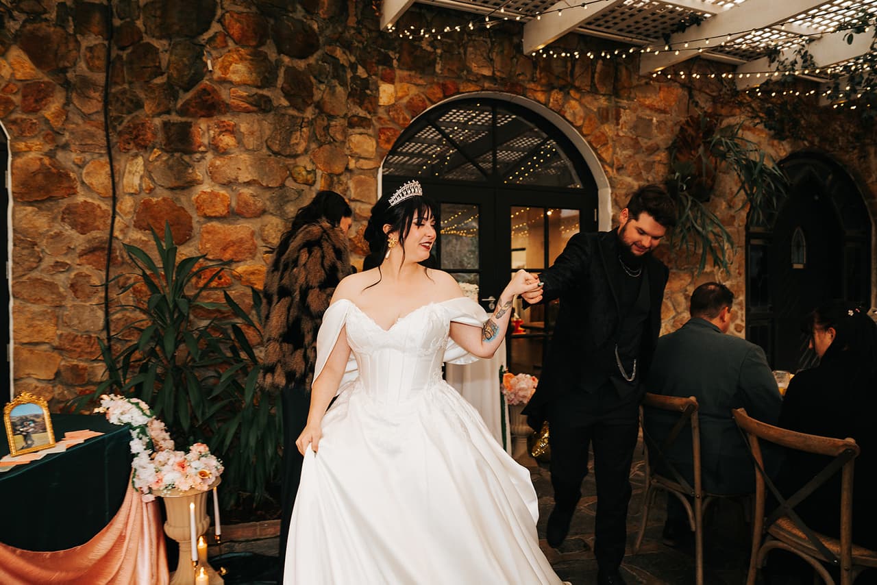 Porscha smiling as she and Jordan make their entrance to the reception